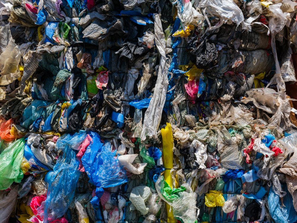 Plastic waste compacted into bales at a recycling centre