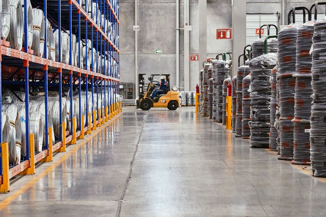 Industrial product lots stored on pallets and warehouse racks
